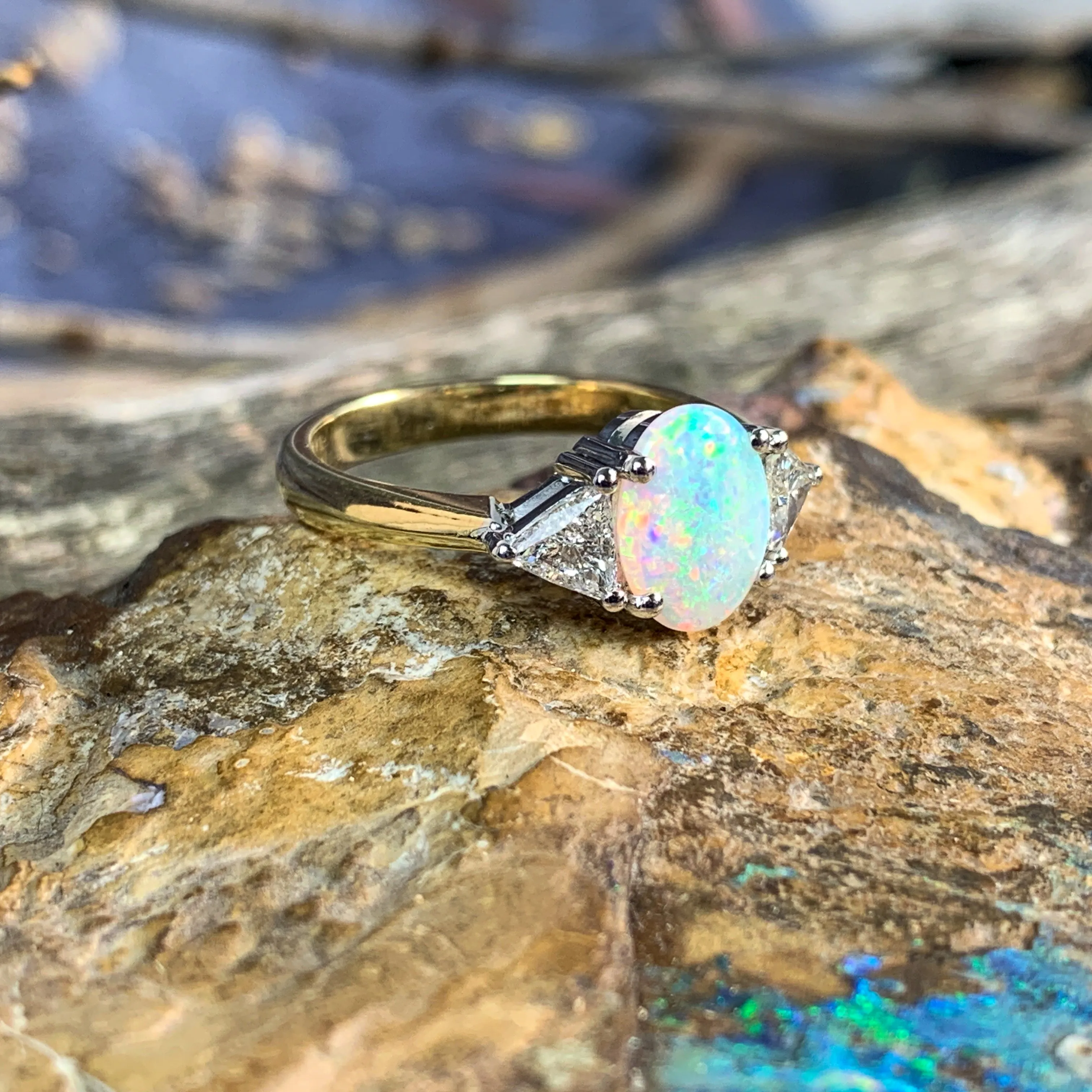 18kt Yellow and White Gold Crystal Opal 1.4ct amd trillion cut diamond ring