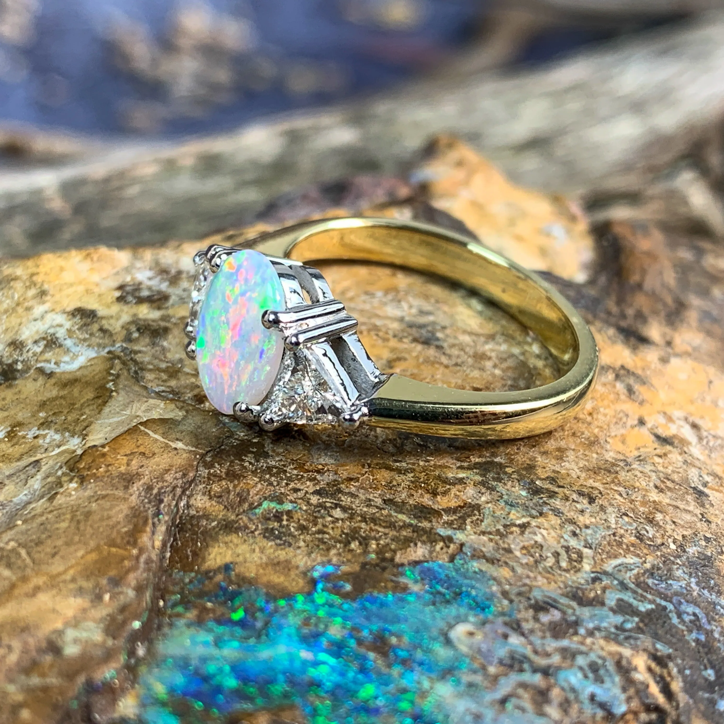 18kt Yellow and White Gold Crystal Opal 1.4ct amd trillion cut diamond ring