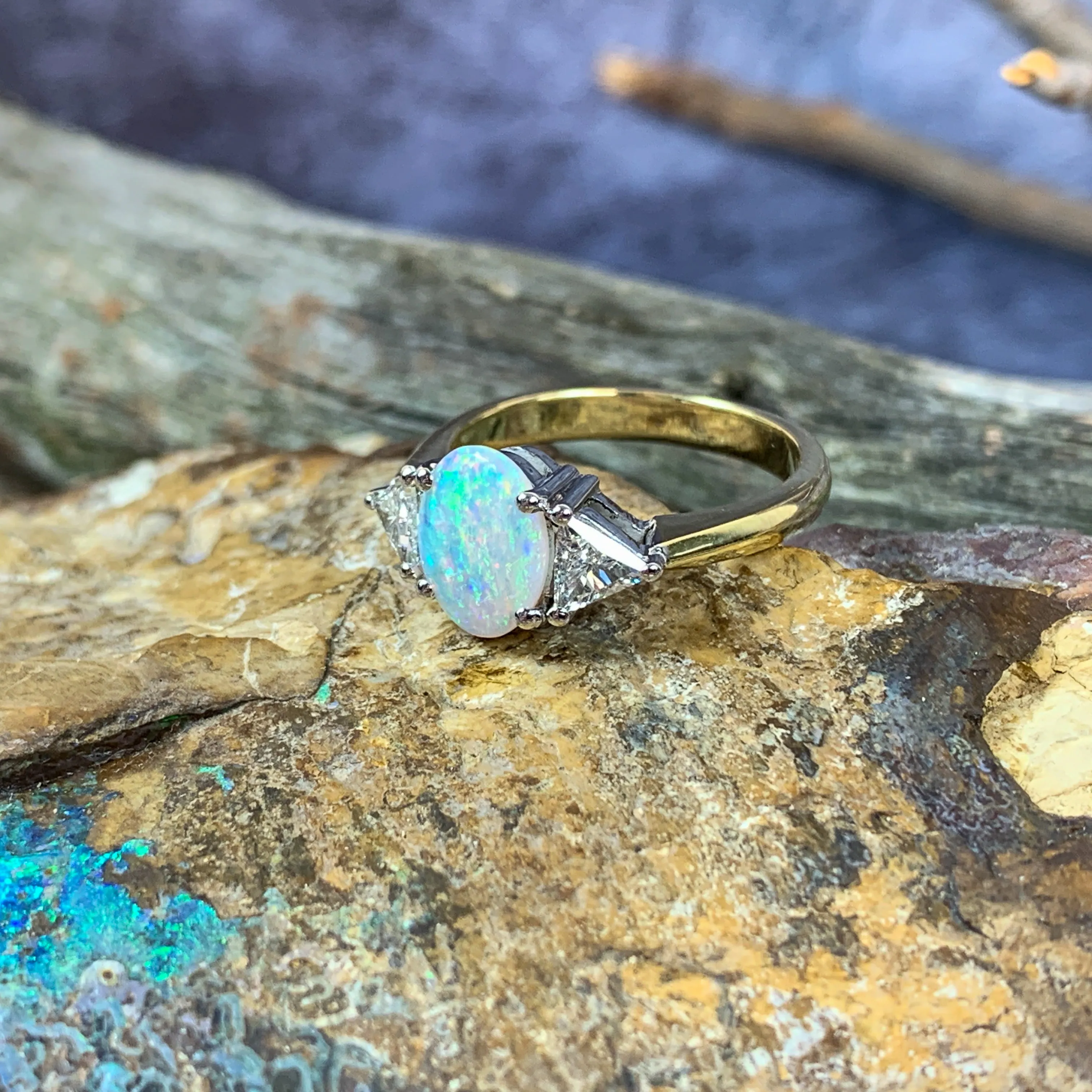 18kt Yellow and White Gold Crystal Opal 1.4ct amd trillion cut diamond ring