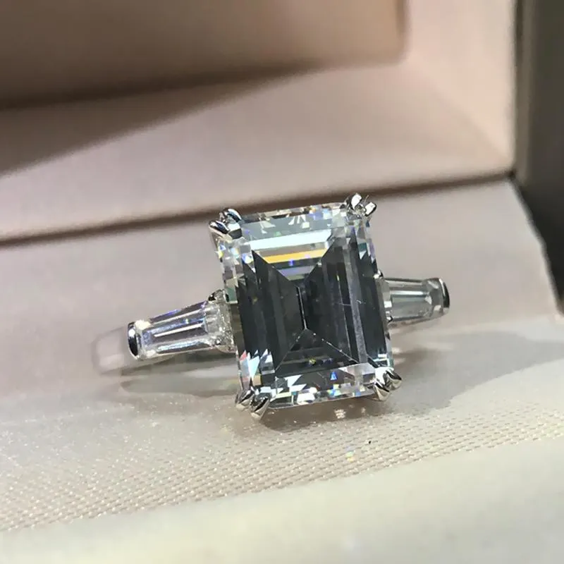 Jolics 3CT Emerald Cut Tapered Double Prong Three Stone Ring