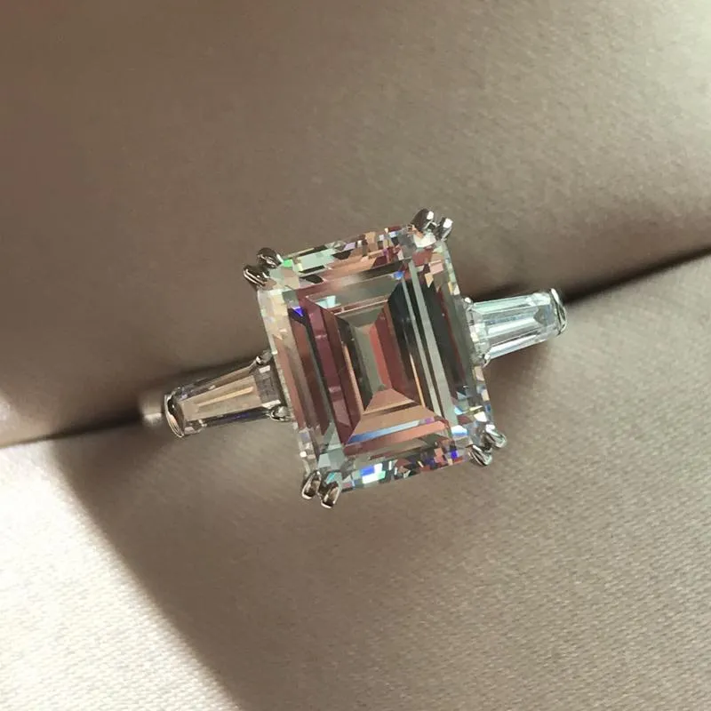 Jolics 3CT Emerald Cut Tapered Double Prong Three Stone Ring